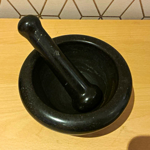 Black stone pestle and - stone,